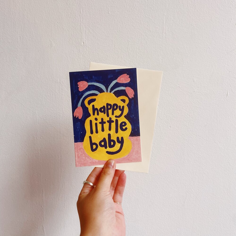 greeting card with text happy little baby